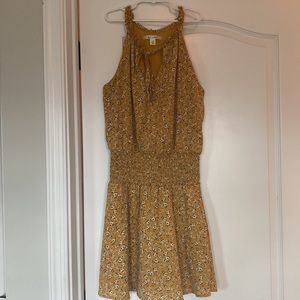 Francesca’s yellow floral dress